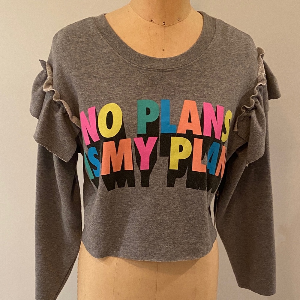 One of a kind designer upcycled sweatshirt.